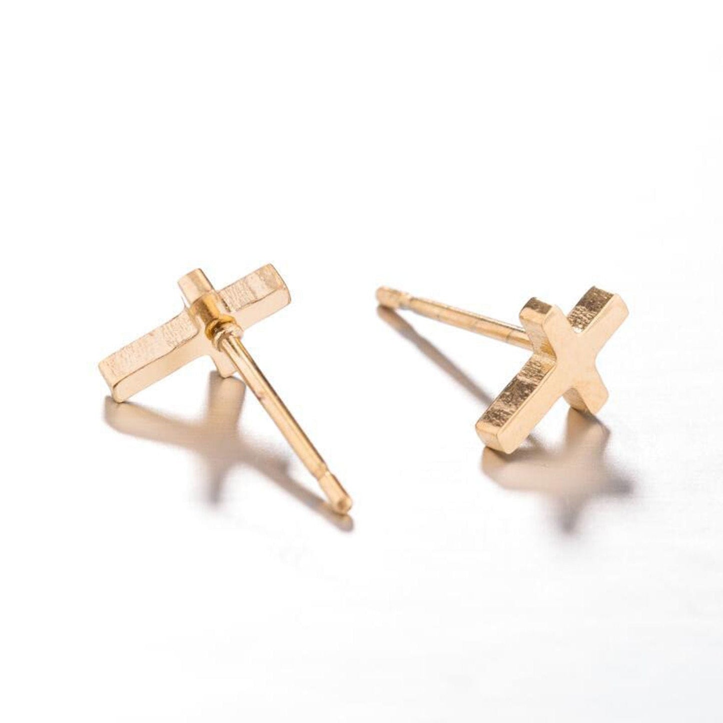 The Smiley Face Boutique ✨ Minimalist Gold Cross Stud Earrings – Chic & Timeless! ✨
