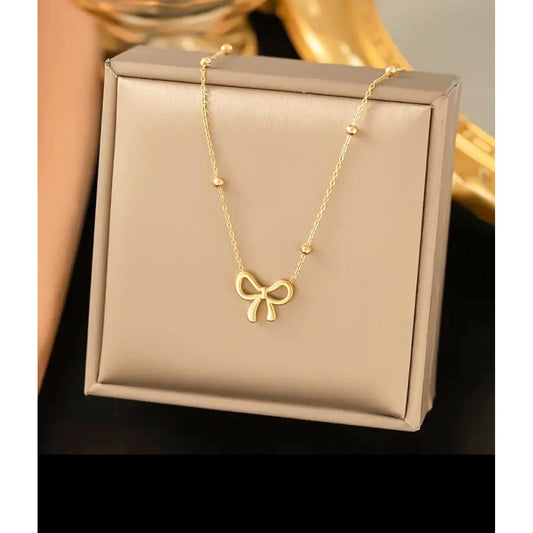 The Smiley Face Boutique Golden Bow Necklace 🎀
